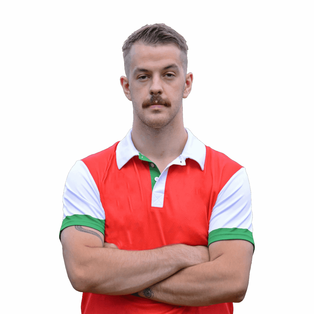 Trener personalny w stroju sportowym, oferujący treningi dla mieszkańców dzielnicy Praga-Południe w Warszawie